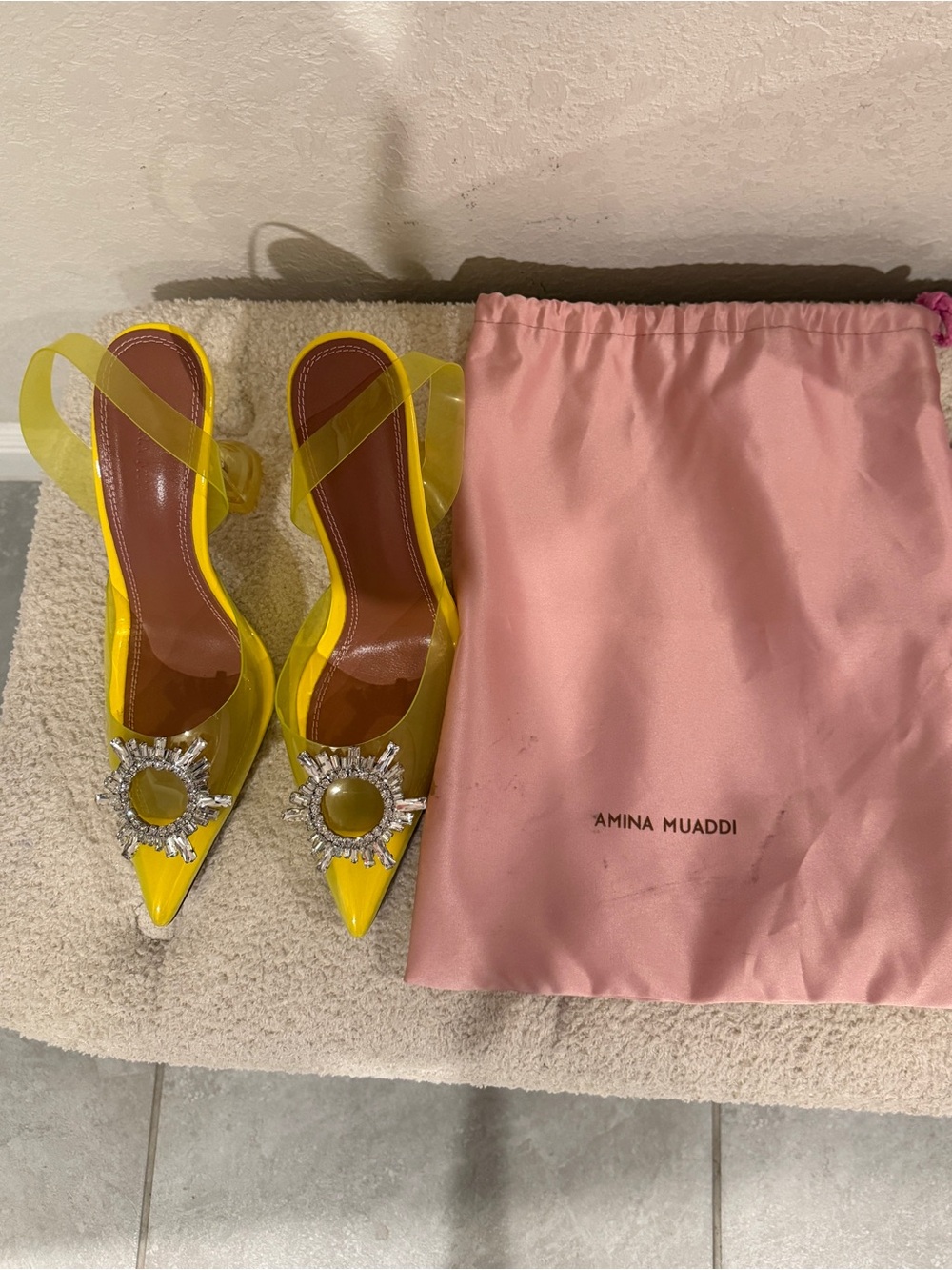 Amina Muaddi Yellow Pointed PVC Slingback Heels with Crystal Sunburst Accents